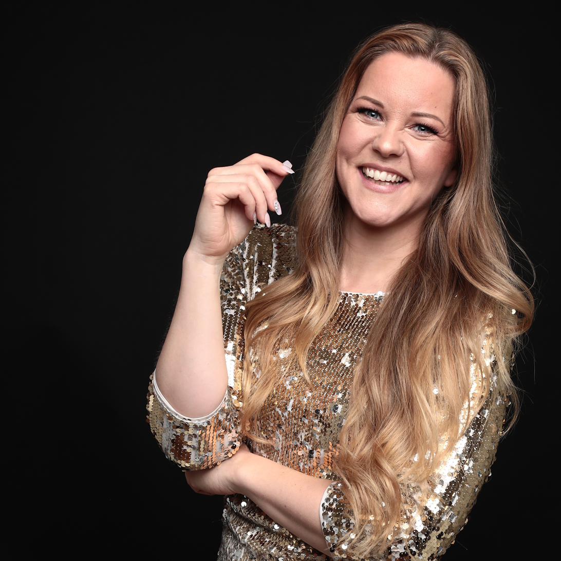 Portrait of Anna Jois in a sequin dress